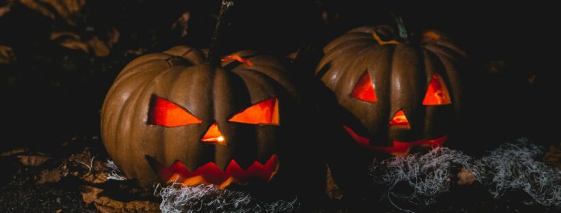 two jack o lantern lamps